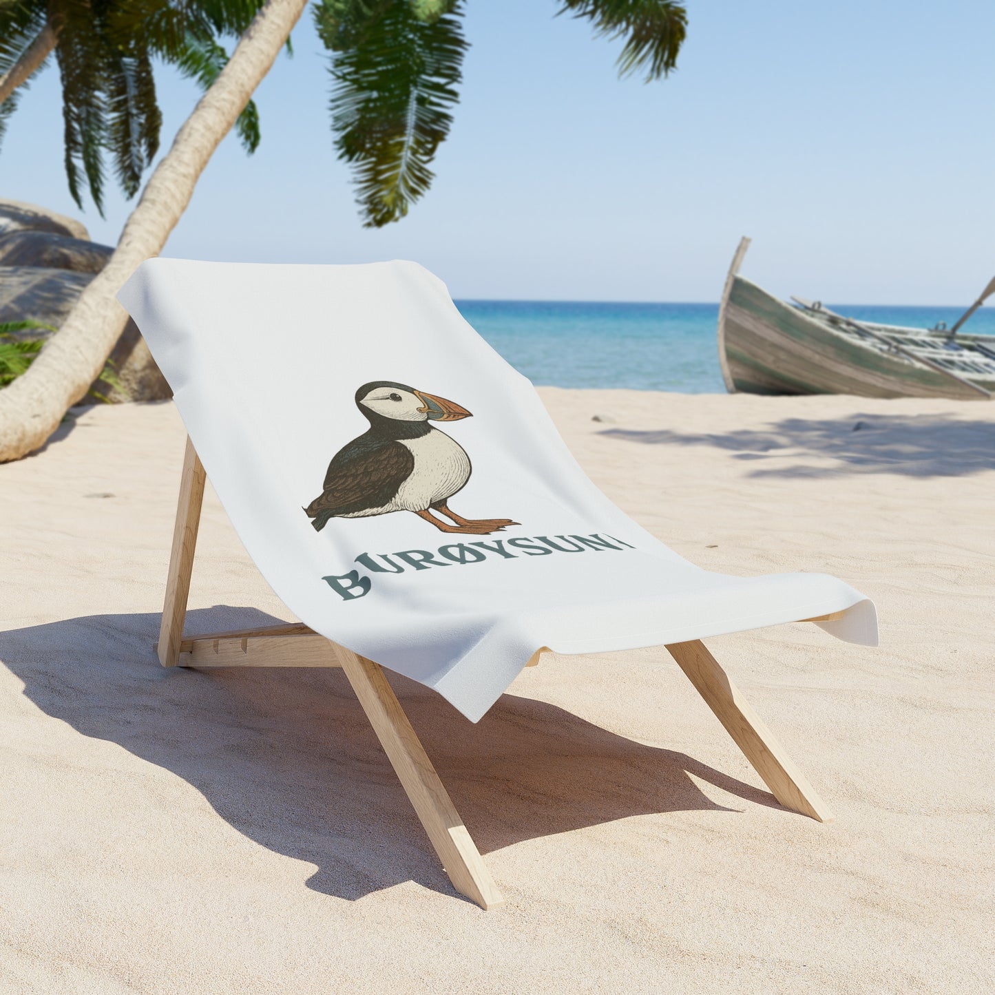 Strandtuch „Puffin Edition“ – Fröhlich. Praktisch. Absolut auffällig.
