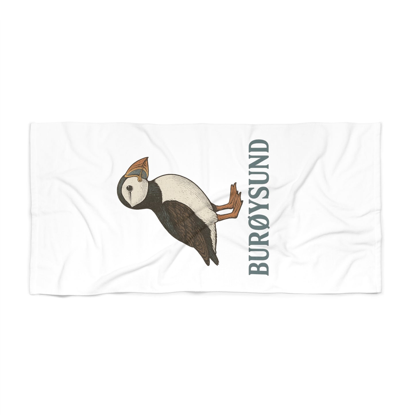 Strandtuch „Puffin Edition“ – Fröhlich. Praktisch. Absolut auffällig.