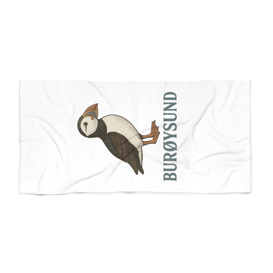 Strandtuch „Puffin Edition“ – Fröhlich. Praktisch. Absolut auffällig.